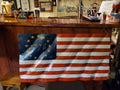 Wood carved USA 1776 wavy flag